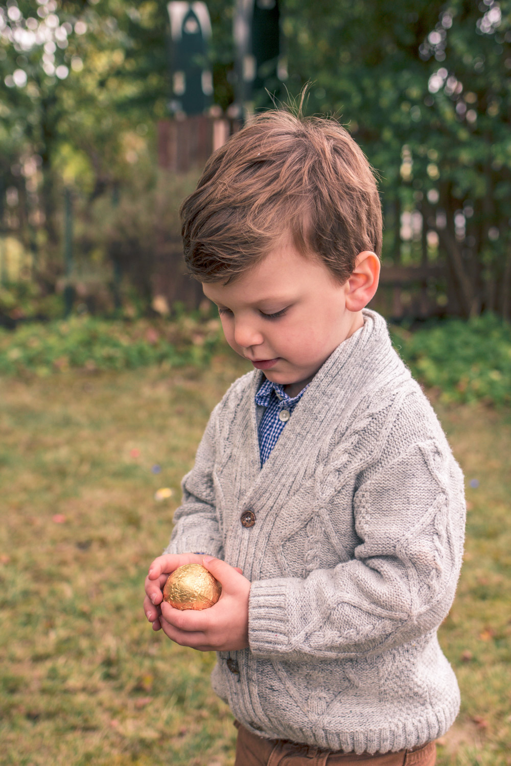 Toddler wearing vintage style knit boys cardigan at Goldfields Girl Autumn Easter Egg Hunt