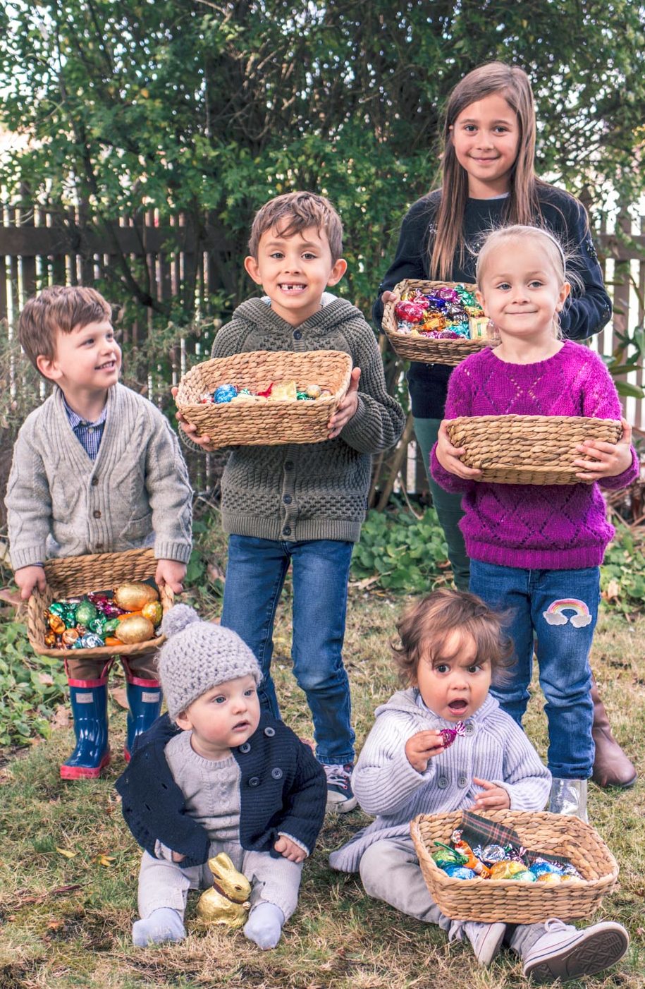 Children holding baskets at Autumn Easter Egg Hunt in Australia