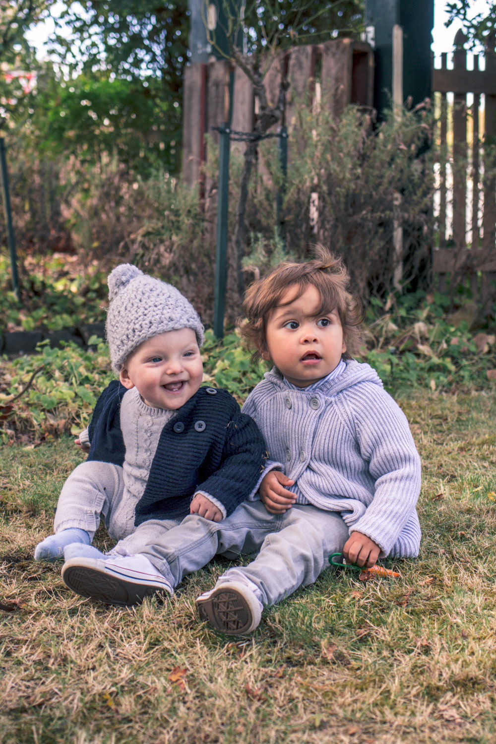 Baby boys wearing Pure Baby knitwear at Autumn Easter Egg Hunt