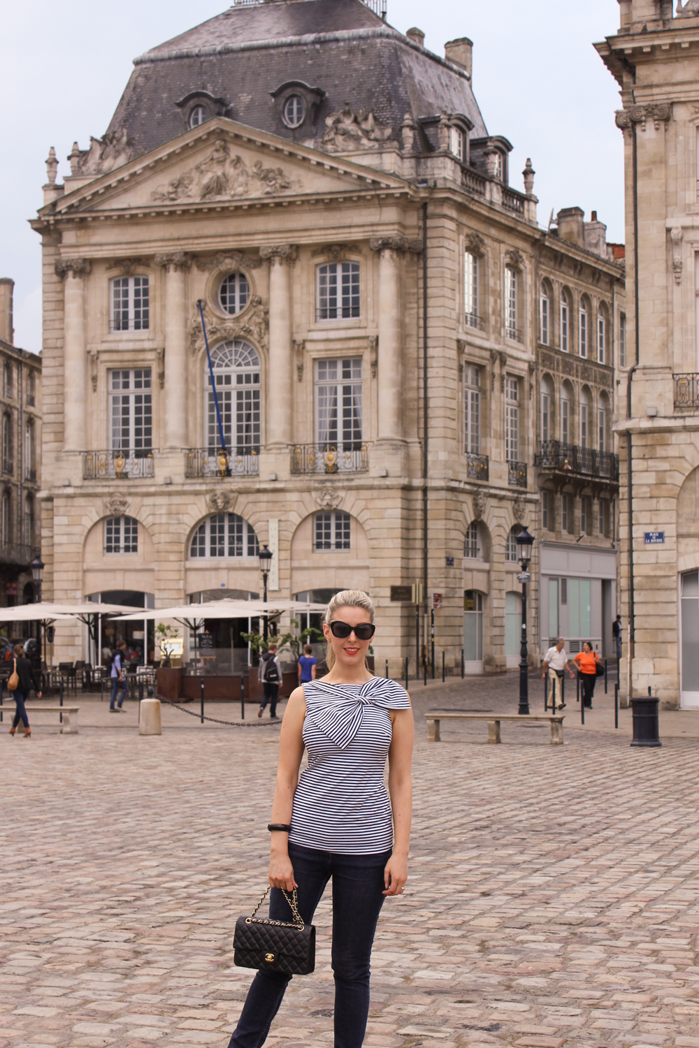 Deneale from Goldfields Girl wearing stripe top and Chanel bag in Paris