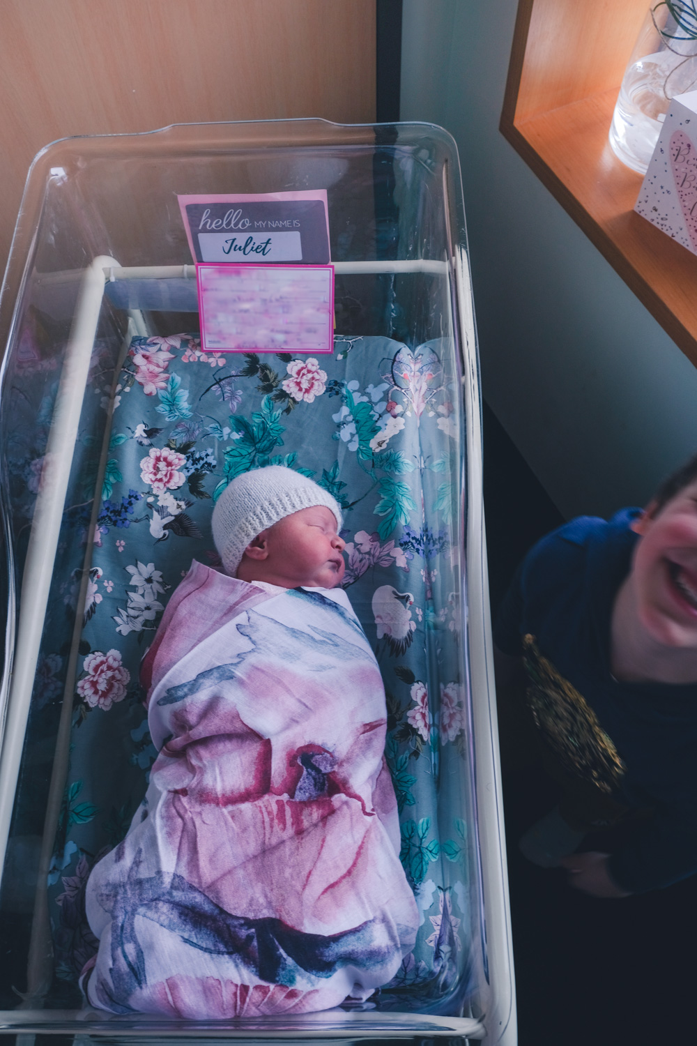 Goldfields Girl newborn baby in hospital wrapped in a pretty blanket and name label