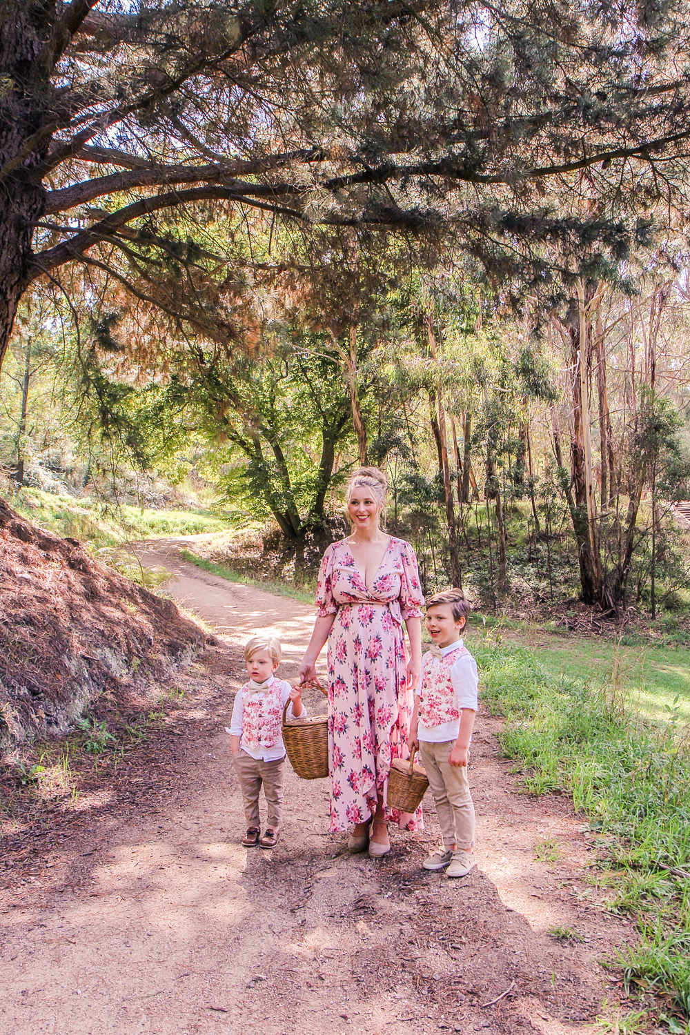 Goldfields Girl walking along forest trail with little boys all holding berry baskets