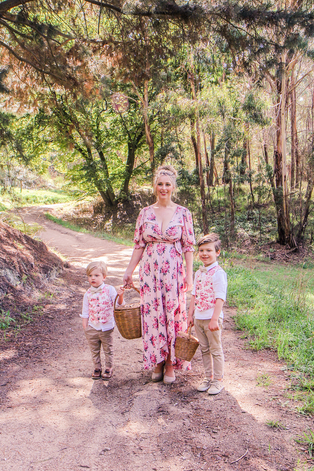 Goldfields Girl walking along forest trail with little boys all holding berry baskets