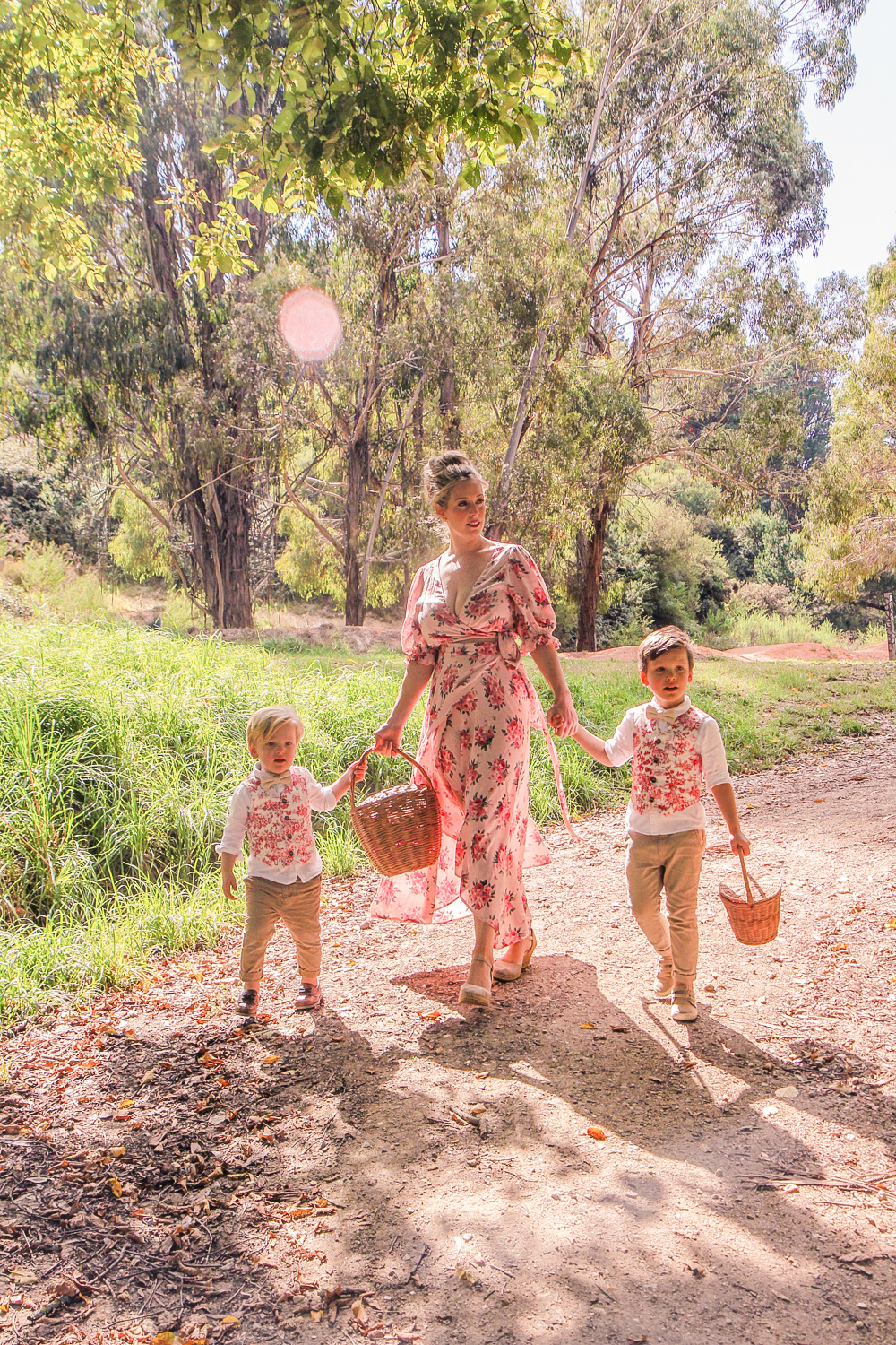 Goldfields Girl walking along forest trail with little boys all holding berry baskets