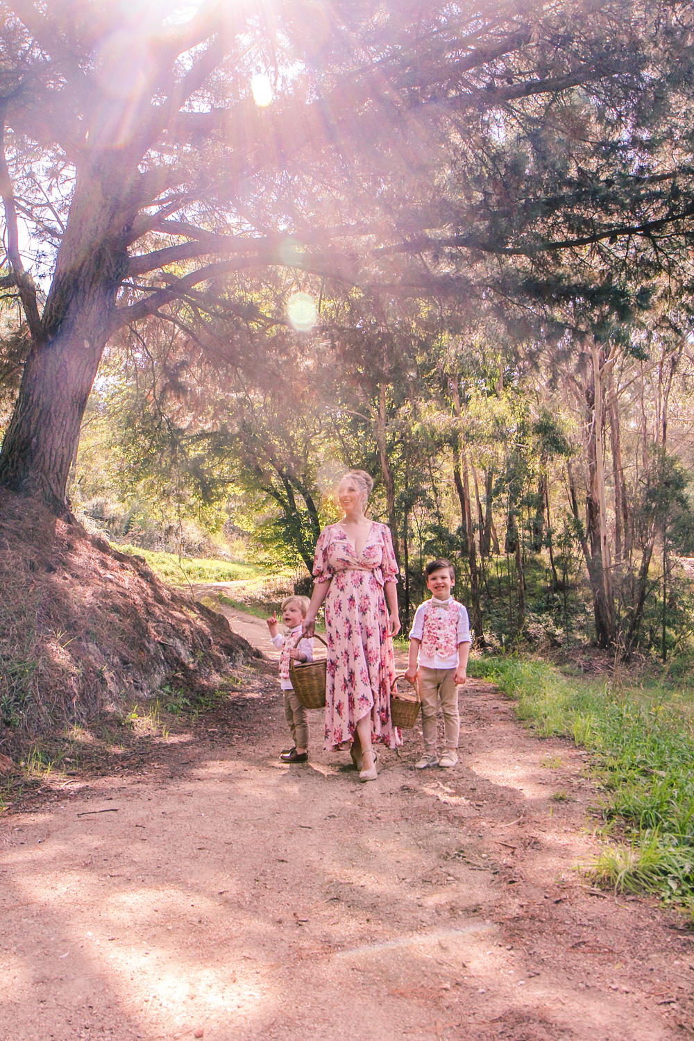 Goldfields Girl walking along forest trail with little boys all holding berry baskets