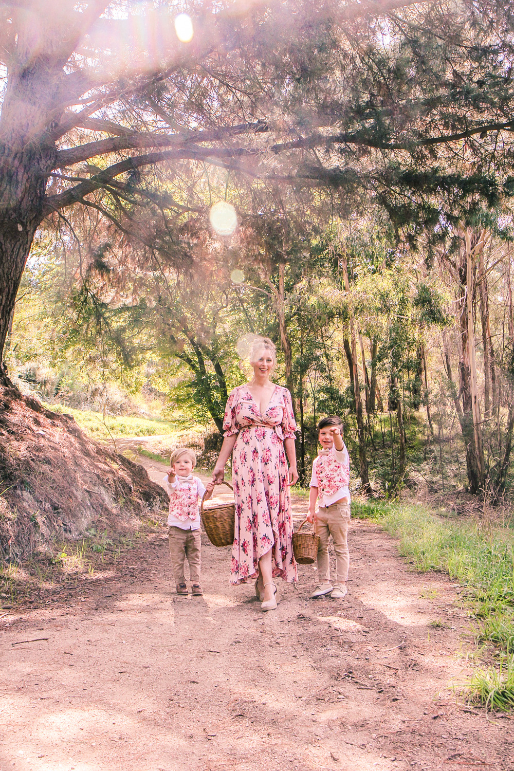 Goldfields Girl walking along forest trail with little boys all holding berry baskets