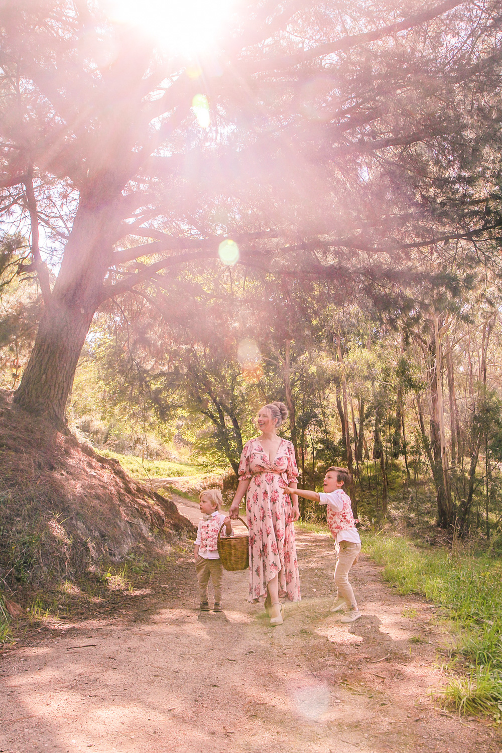 Goldfields Girl walking along forest trail with little boys all holding berry baskets